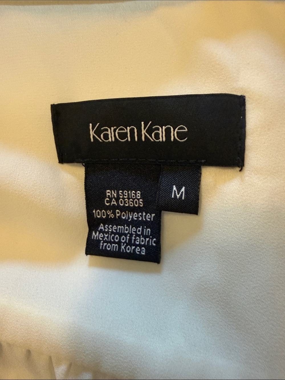 Karen Kane Ivory Silk-Look Blouse